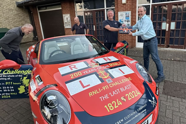 Chiswick RNLI station manager Wayne Bellamy welcomes Christian Harper