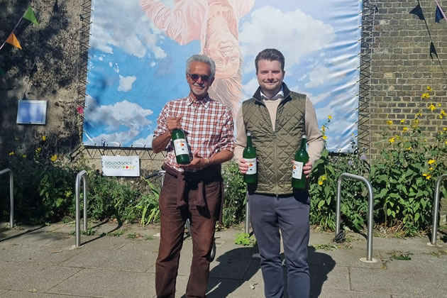 Cllr Ranjit Gill and Cllr Jack Emsley by the new artwork on Turnham Green Terrace